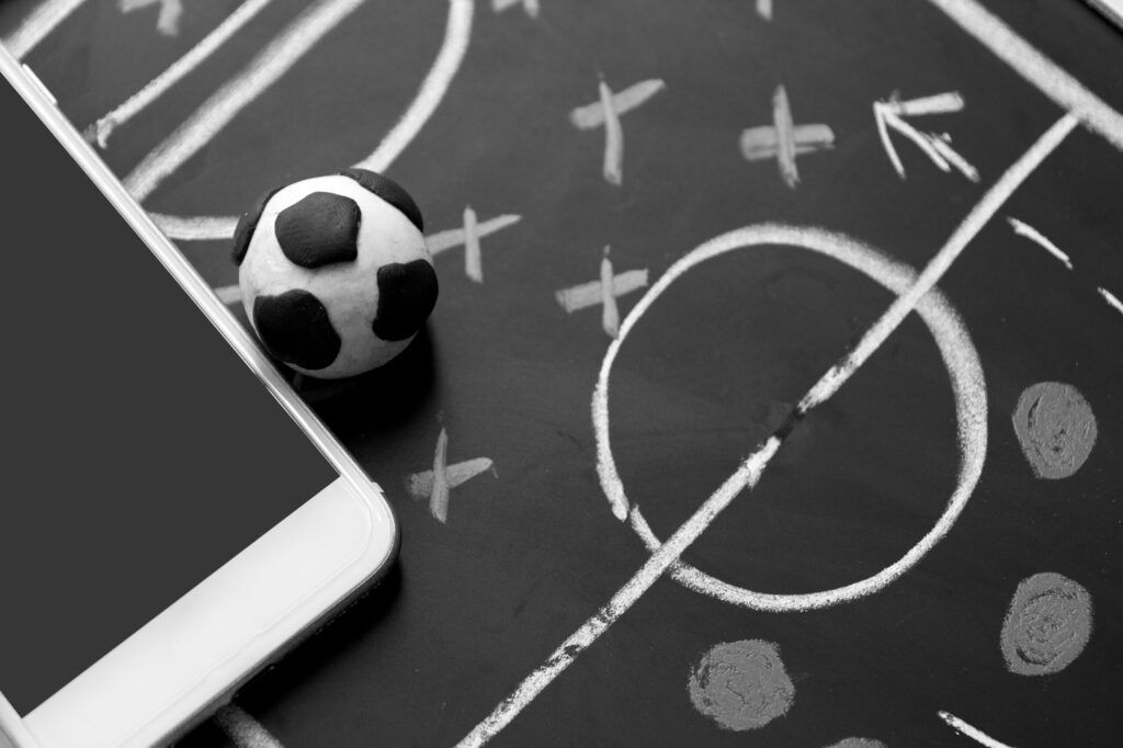 A chalkboard with football tactics