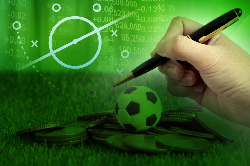 Football tactics being drawn on a whiteboard