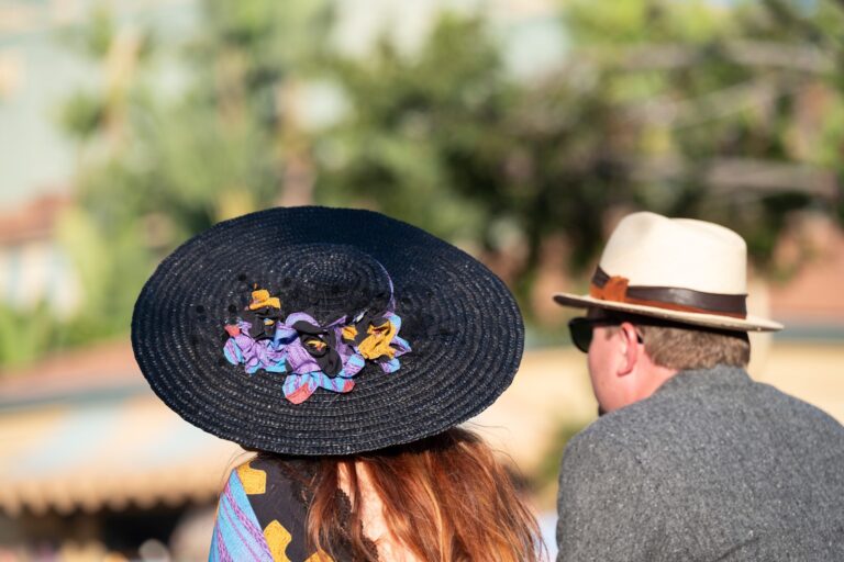 Two formally dressed racegoers at Ascot weekend