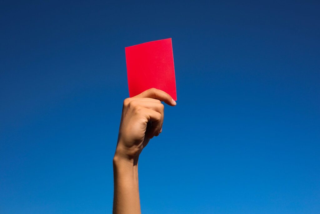 Referee shows Jarell Quansah a red card in the World Cup
